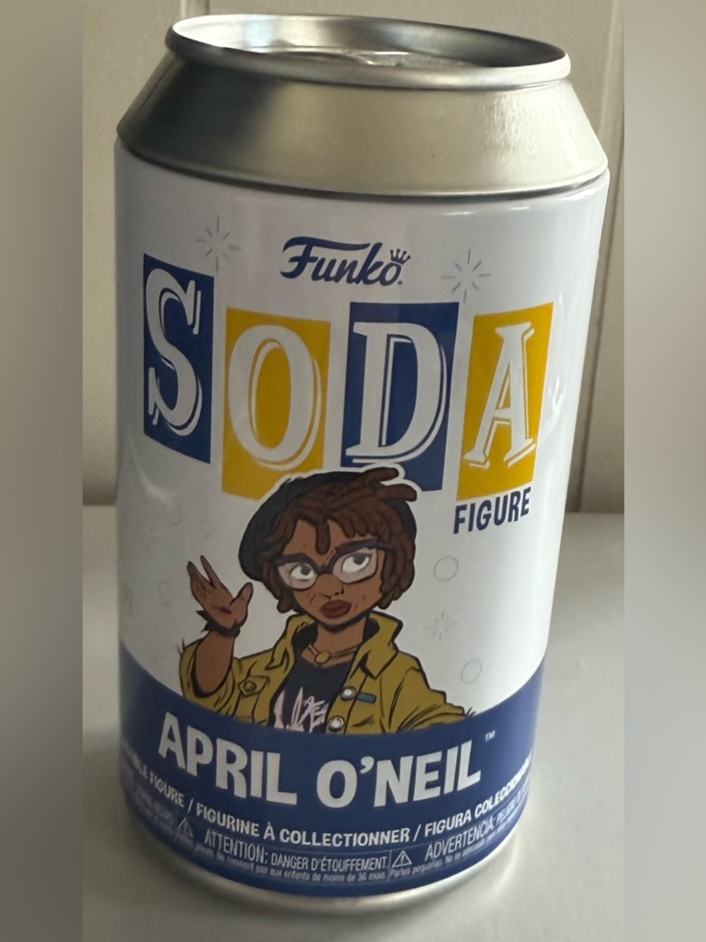 Funko SODA April O'Neil Tin - White, Blue, Yellow, Brown